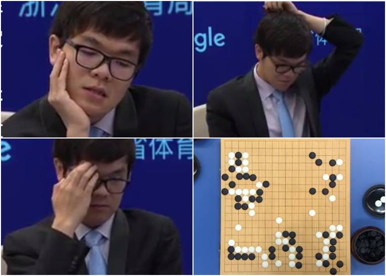 由世界第一,中国9段棋手柯洁大战人工智能程式alphago,首局对战由柯洁